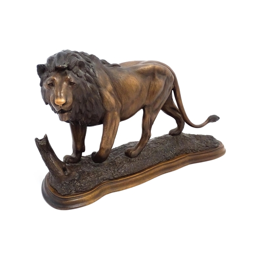 1515 - A 20thC limited edition Tim Nicklin sculpture depicting a prowling lion. Signed, numbered 18 / 20 an... 