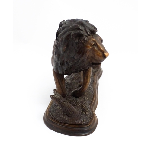 1515 - A 20thC limited edition Tim Nicklin sculpture depicting a prowling lion. Signed, numbered 18 / 20 an... 