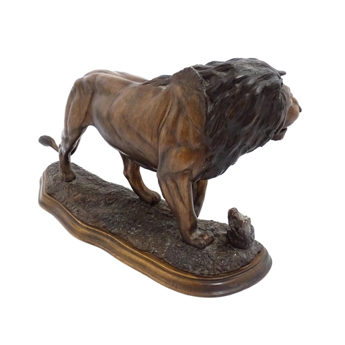 1515 - A 20thC limited edition Tim Nicklin sculpture depicting a prowling lion. Signed, numbered 18 / 20 an... 