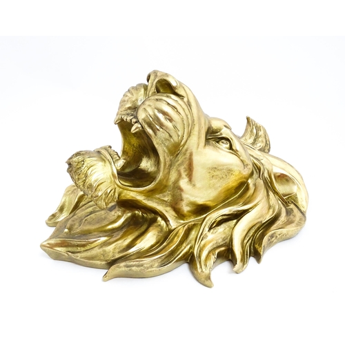 1516 - An early 21stC gilt wall hanging lion head. Approx. 19