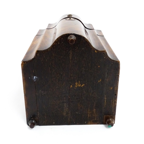 1518 - A 19thC mahogany knife box with a serpentine front opening to reveal a fitted interior, and raised o... 