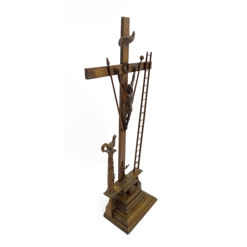 1535 - A large 20thC carved wooden crucifix with the Instruments of the Passion / Arma Christi / weapons of... 