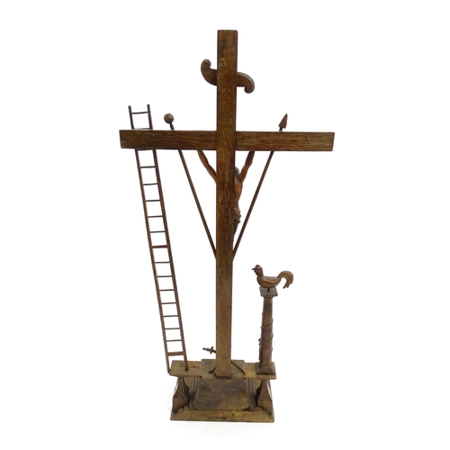 1535 - A large 20thC carved wooden crucifix with the Instruments of the Passion / Arma Christi / weapons of... 