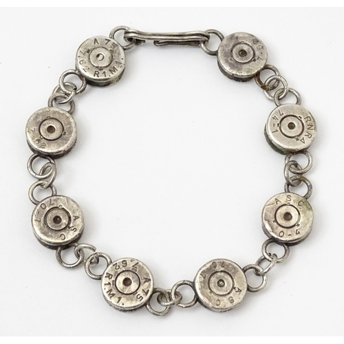 966 - An unusual bracelet formed from c. 1970s 7.62 bullet cases stamped for Rhodesian National Rifle Asso... 