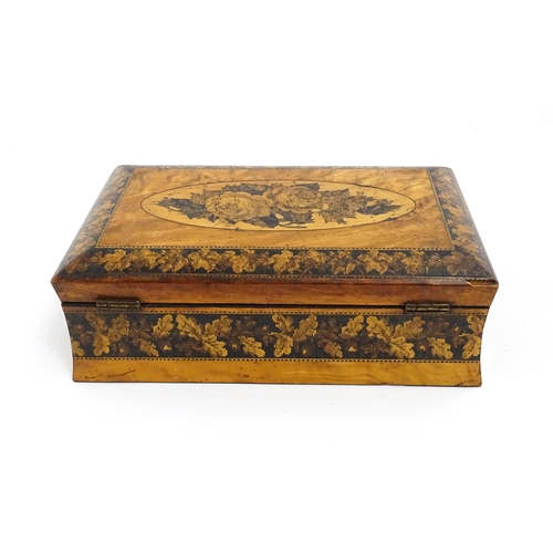 1446 - A Victorian Tunbridge ware box of waisted form with floral and foliate decoration. Approx. 9 3/4