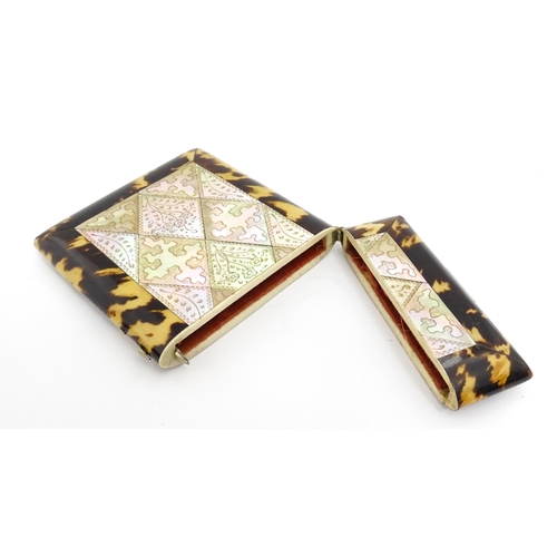 1450 - A Victorian tortoiseshell and mother of pearl card case with engraved floral decoration. Approx. 4