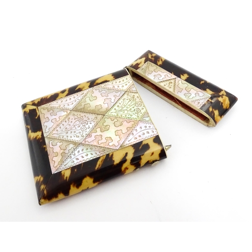 1450 - A Victorian tortoiseshell and mother of pearl card case with engraved floral decoration. Approx. 4