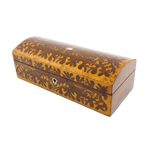 1454 - A 20thC walnut glove box with inlaid foliate marquetry decoration, and mother of pearl escutcheon. W... 