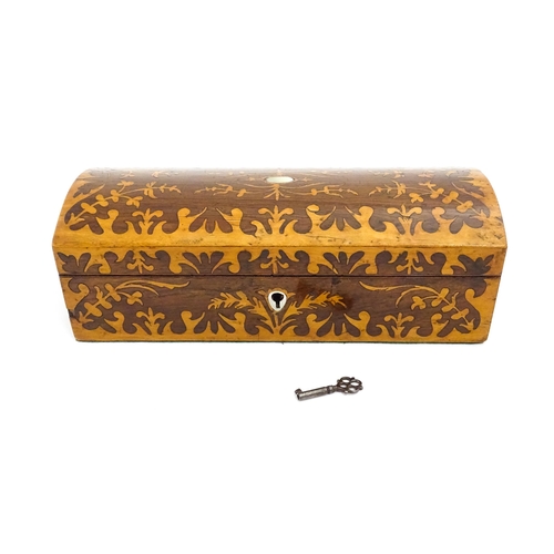 1454 - A 20thC walnut glove box with inlaid foliate marquetry decoration, and mother of pearl escutcheon. W... 