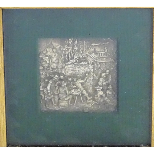 1456 - A 20thC Dutch pewter plaque decorated in high relief with figures drinking and smoking. Frame approx... 