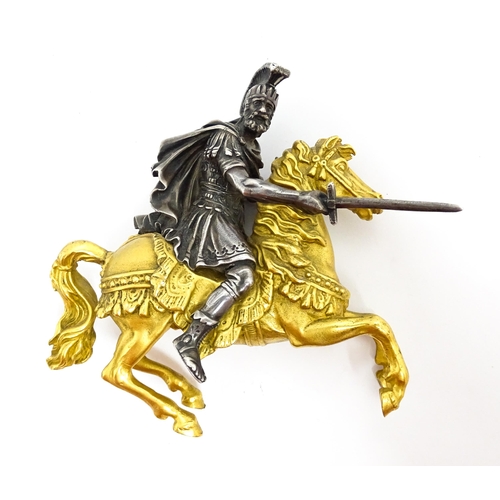 1464 - A late 19th / early 20thC bronze and gilt bronze sculpture modelled as a knight on horseback. Togeth... 