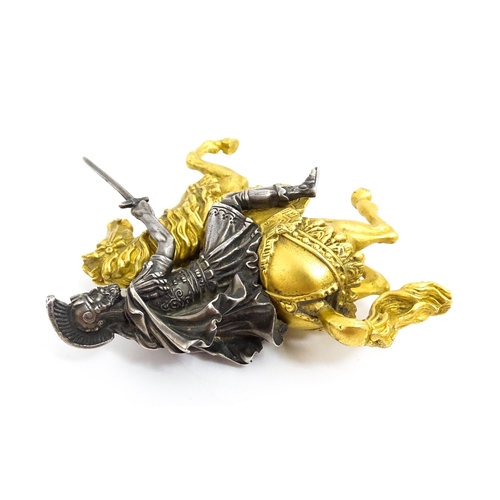 1464 - A late 19th / early 20thC bronze and gilt bronze sculpture modelled as a knight on horseback. Togeth... 