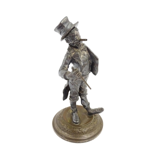 1473 - A late 19th / early 20thC novelty table lighter modelled as a dandy wearing a top hat holding a cane... 