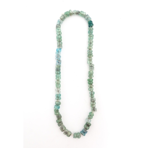 301A - A necklace made of aqua glass beads. Approx. 28