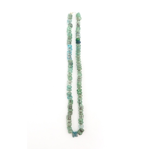 301A - A necklace made of aqua glass beads. Approx. 28