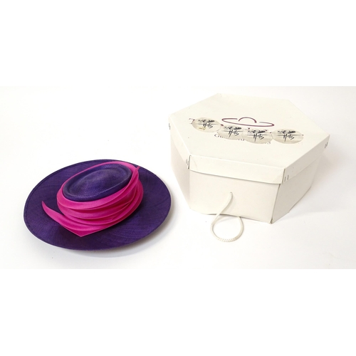 1196 - Vintage fashion / clothing: A Philip Treacy purple wide brim hat with pink swirl banding.