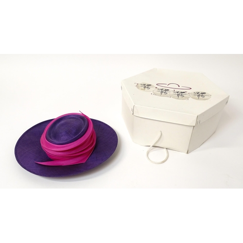 1196 - Vintage fashion / clothing: A Philip Treacy purple wide brim hat with pink swirl banding.