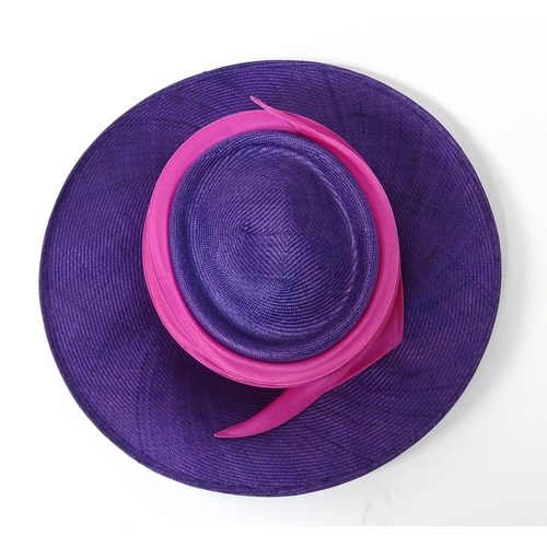 1196 - Vintage fashion / clothing: A Philip Treacy purple wide brim hat with pink swirl banding.