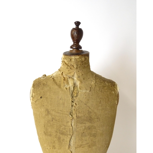 1199 - A tailor's / dressmaker's mannequin, revolving on a turned tripod base, approx 62 1/2