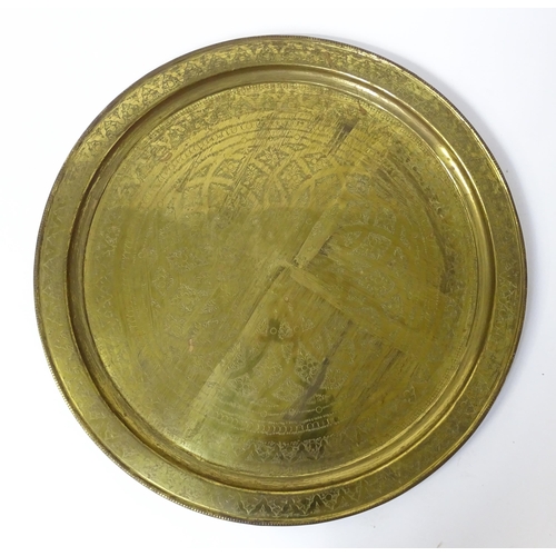 1537 - A large 20thC brass charger / table top with floral and foliate punchwork decoration. Approx. 37 3/4... 