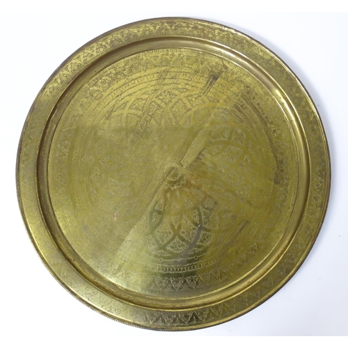 1537 - A large 20thC brass charger / table top with floral and foliate punchwork decoration. Approx. 37 3/4... 