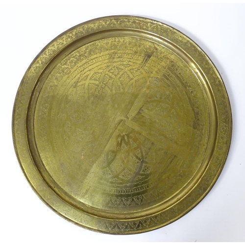 1537 - A large 20thC brass charger / table top with floral and foliate punchwork decoration. Approx. 37 3/4... 