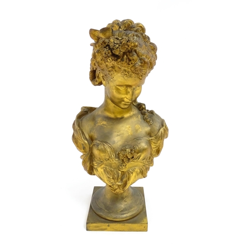 1544 - An early 20thC gilt metal bust of a lady with flowers in her hair, after Hippolyte Francois Moreau. ... 