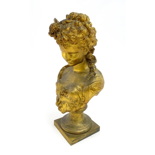 1544 - An early 20thC gilt metal bust of a lady with flowers in her hair, after Hippolyte Francois Moreau. ... 