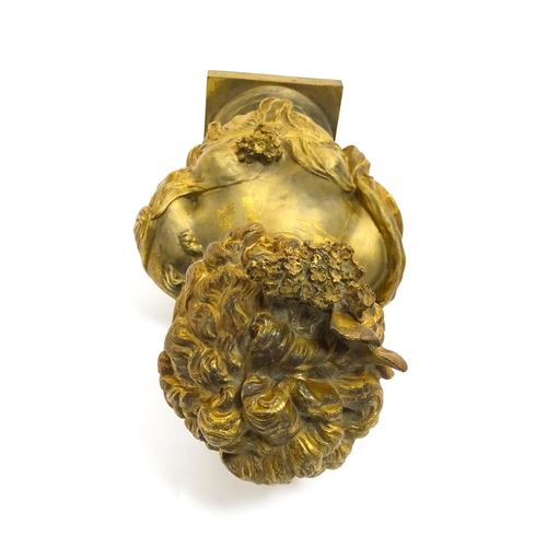 1544 - An early 20thC gilt metal bust of a lady with flowers in her hair, after Hippolyte Francois Moreau. ... 