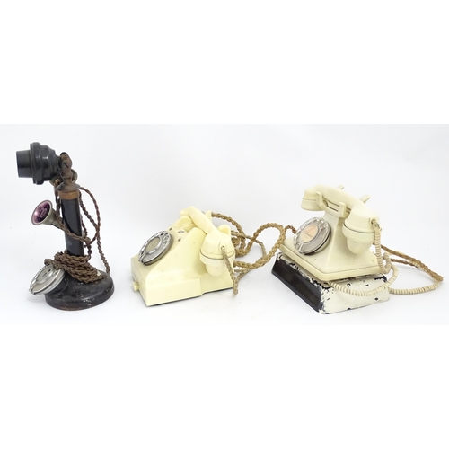 1547 - Four assorted mid 20thC GPO telephones, 
together with a candlestick telephone, the largest approx 1... 