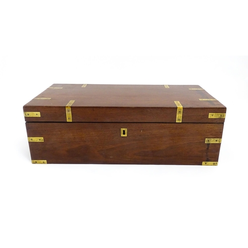 1550 - A 19thC brass bound mahogany writing slope with drawer to one side and having a fitted interior. App... 