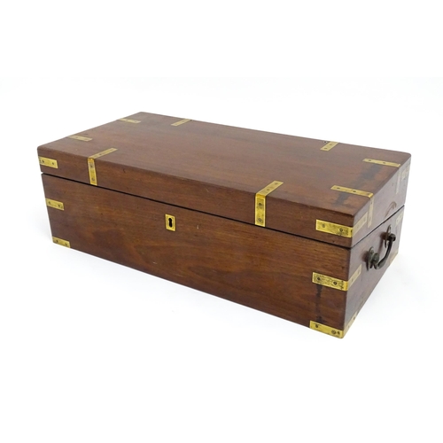 1550 - A 19thC brass bound mahogany writing slope with drawer to one side and having a fitted interior. App... 