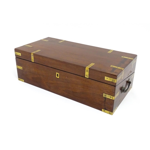 1550 - A 19thC brass bound mahogany writing slope with drawer to one side and having a fitted interior. App... 