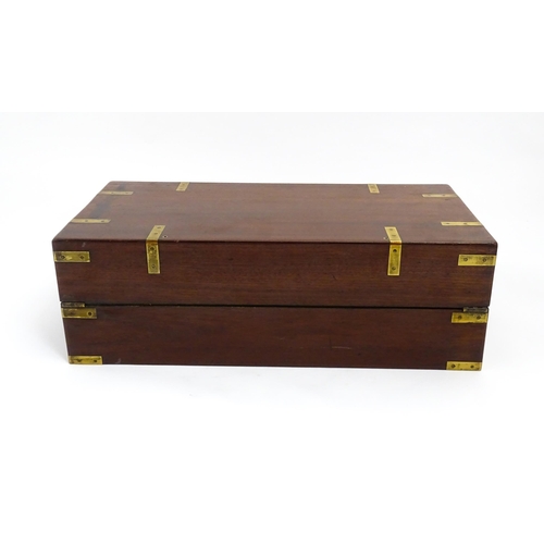 1550 - A 19thC brass bound mahogany writing slope with drawer to one side and having a fitted interior. App... 