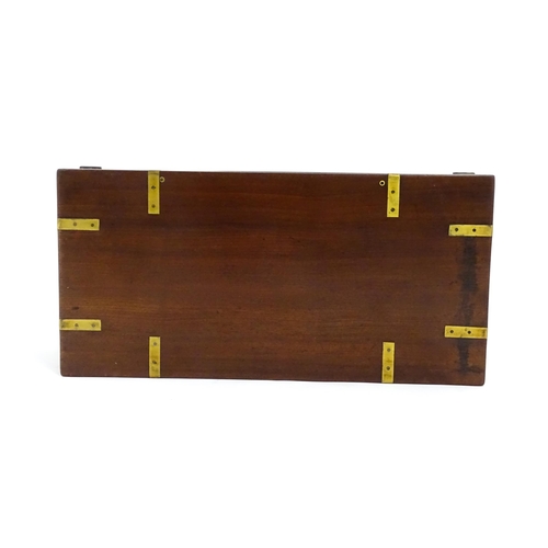 1550 - A 19thC brass bound mahogany writing slope with drawer to one side and having a fitted interior. App... 