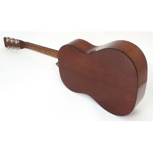 267 - Musical Instrument: a mid to late 20thC B25 style acoustic guitar, the sloped-shoulder grand concert... 