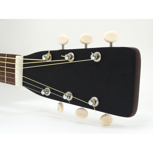 267 - Musical Instrument: a mid to late 20thC B25 style acoustic guitar, the sloped-shoulder grand concert... 