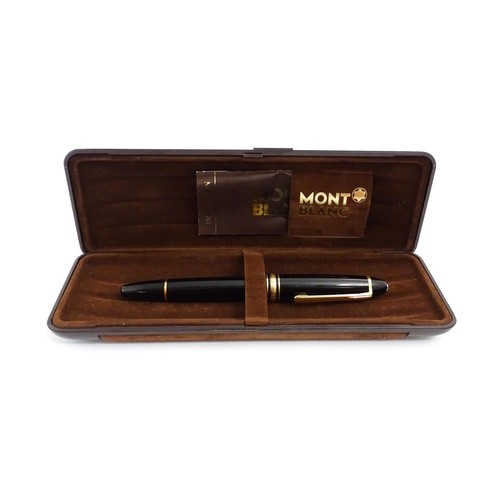 1424 - A cased Montblanc Meisterstuck no. 146 fountain pen, with 14k gold 4810 nib. Approx 5 1/4