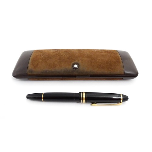 1424 - A cased Montblanc Meisterstuck no. 146 fountain pen, with 14k gold 4810 nib. Approx 5 1/4