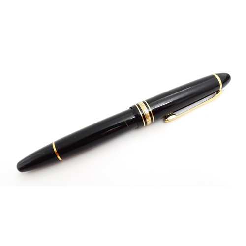 1424 - A cased Montblanc Meisterstuck no. 146 fountain pen, with 14k gold 4810 nib. Approx 5 1/4