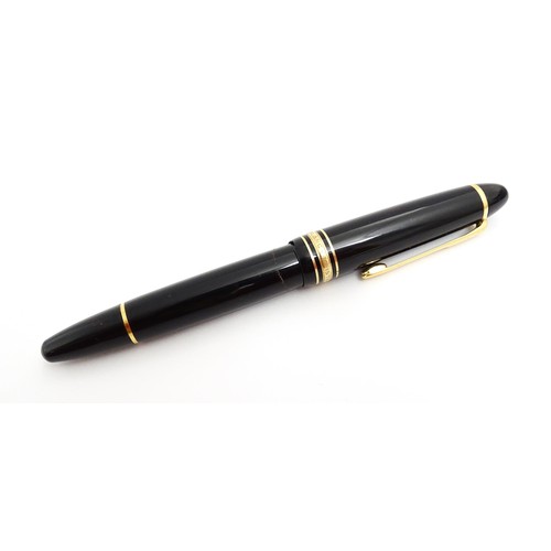 1424 - A cased Montblanc Meisterstuck no. 146 fountain pen, with 14k gold 4810 nib. Approx 5 1/4