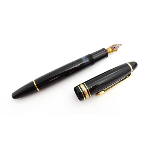 1424 - A cased Montblanc Meisterstuck no. 146 fountain pen, with 14k gold 4810 nib. Approx 5 1/4