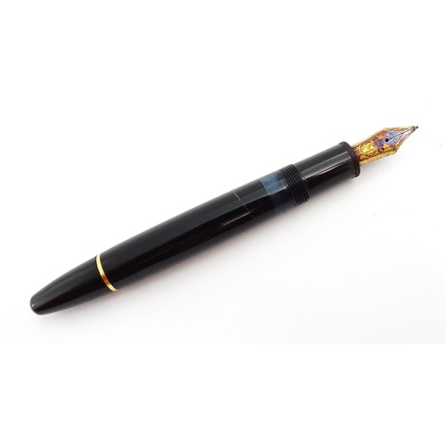 1424 - A cased Montblanc Meisterstuck no. 146 fountain pen, with 14k gold 4810 nib. Approx 5 1/4