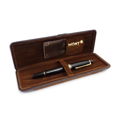 1424 - A cased Montblanc Meisterstuck no. 146 fountain pen, with 14k gold 4810 nib. Approx 5 1/4