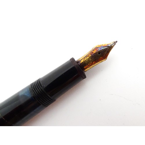 1424 - A cased Montblanc Meisterstuck no. 146 fountain pen, with 14k gold 4810 nib. Approx 5 1/4