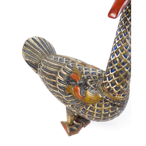 1576 - A very large 20thC carved wooden model of a goose with polychrome decoration. Approx. 50