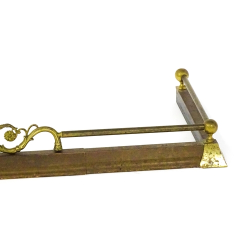 1586 - A 19thC brass fire fender of adjustable length.  52