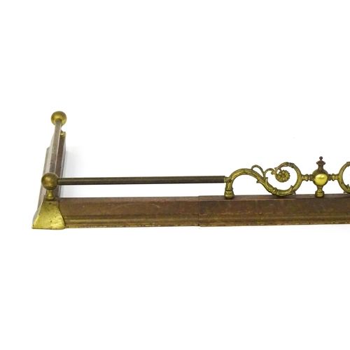 1586 - A 19thC brass fire fender of adjustable length.  52