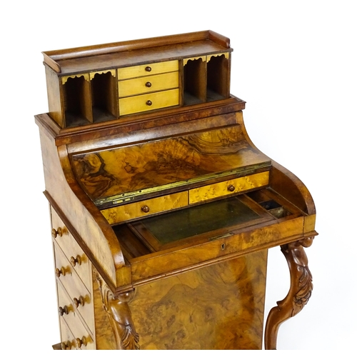 1709 - A late 19thC walnut piano top, pop up Davenport. The sprung top opening to show three short drawers ... 