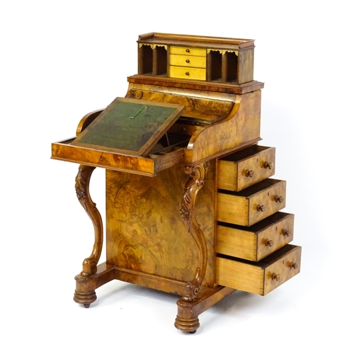 1709 - A late 19thC walnut piano top, pop up Davenport. The sprung top opening to show three short drawers ... 